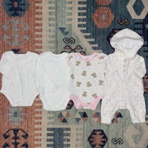 4 pieces of newborn clothing